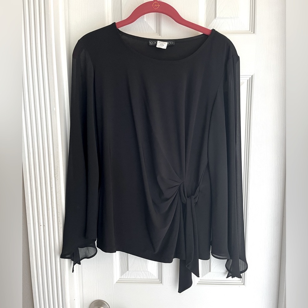Black blouse with sheer sleeves